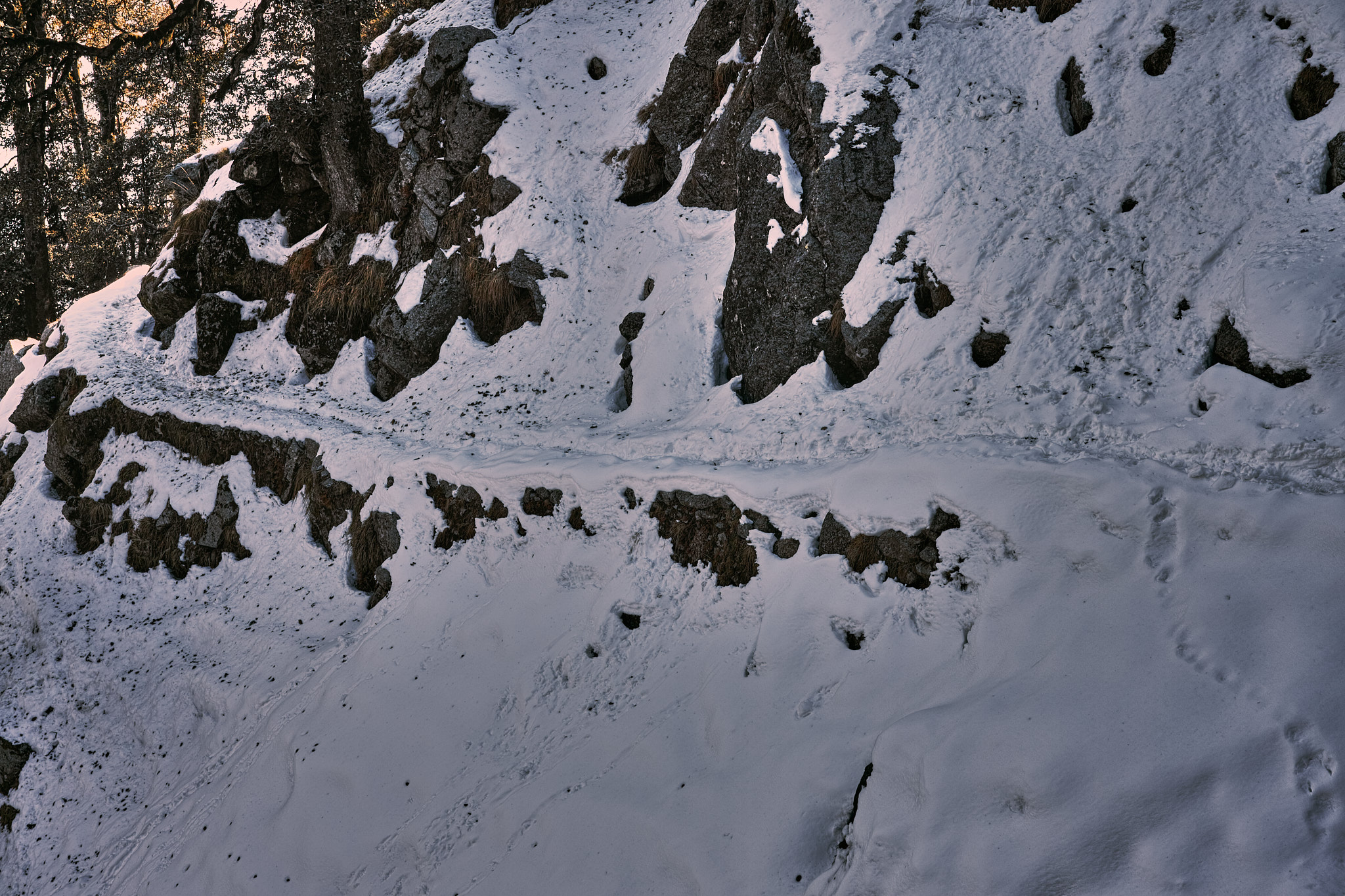 Heavy snow accumulates along the trail at 22 curves