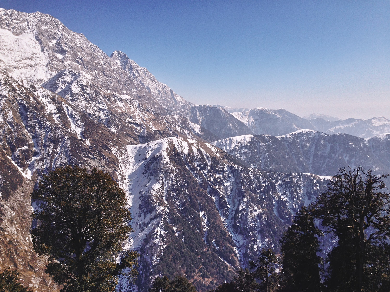 Indrahar Pass and Dhauladhars from Snow Line Cafe, Triund, are a touching Distance